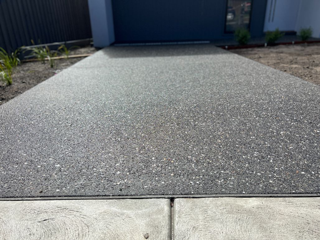 Concreters Bayside installing a new concrete driveway in exposed aggregate in Mentone