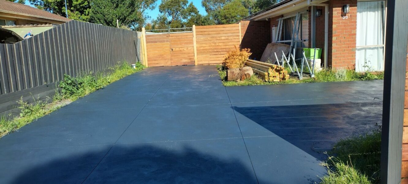 Coloured concrete driveway Hampton installed by our team of concreters Hampton
